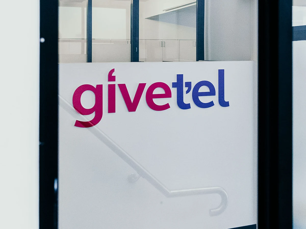 GiveTel office entrance and brand signage